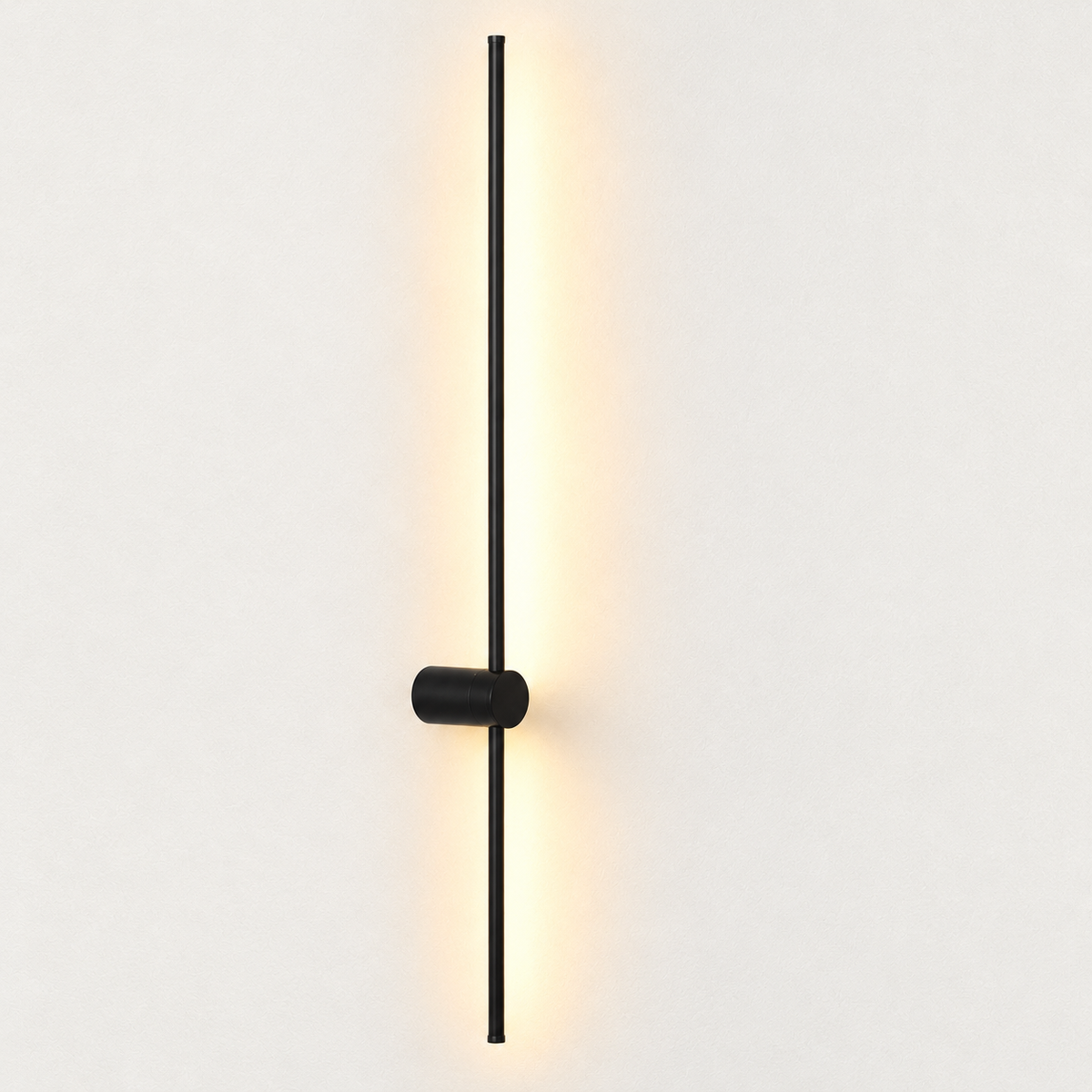 Aplique LED lineal negro 20005 de 100 cm encendido con luz cálida 3000 K, vista vertical completa; representación ambiental
