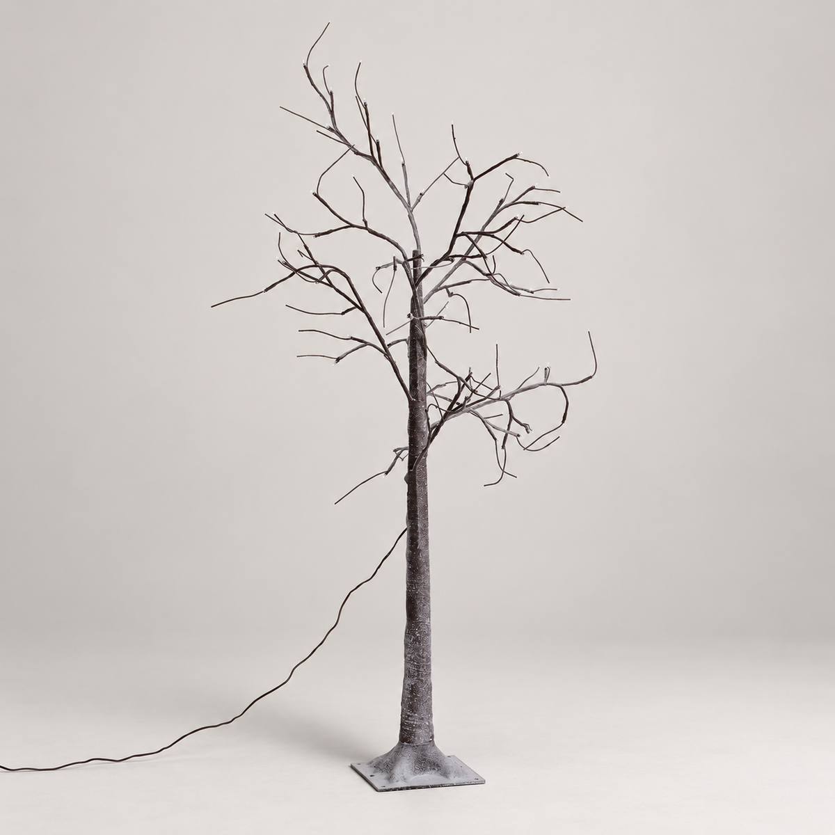 Árbol decorativo LED con ramas y base cuadrada, vista completa