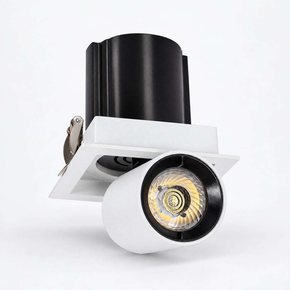 Foco LED empotrable cuadrado de 12 W con marco blanco, cabezal extraíble y cuerpo posterior negro sobre fondo limpio