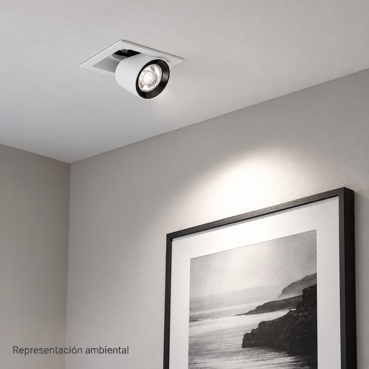 Representación ambiental del foco LED empotrable blanco de 6000K instalado en techo e iluminando un cuadro