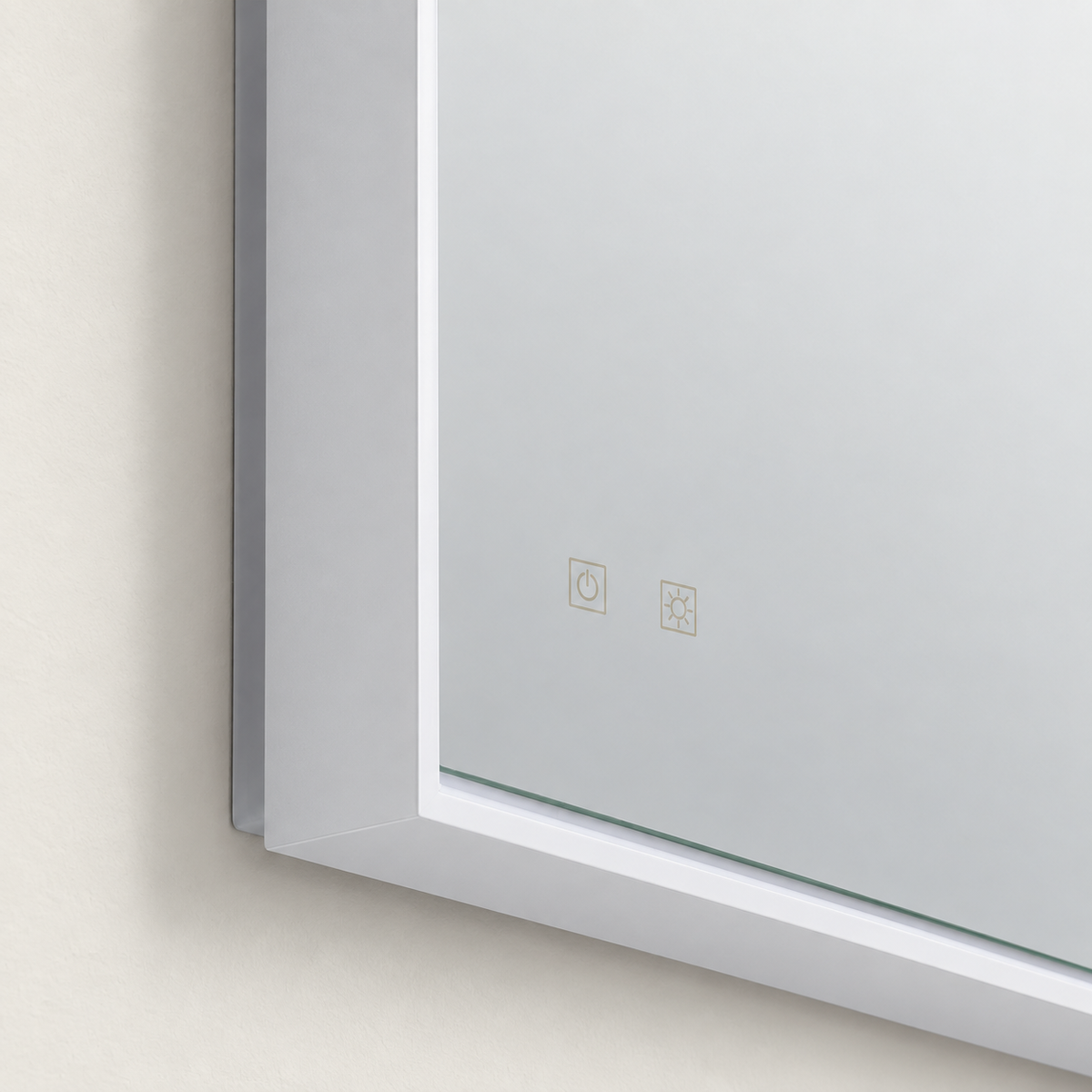 Detalle del marco y los dos controles del espejo vertical de baño